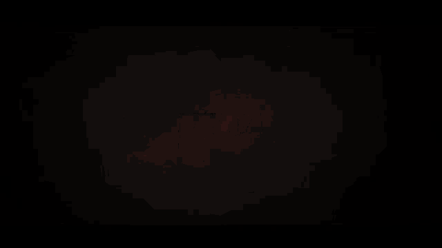 a dark background with a red glowing circle in the middle