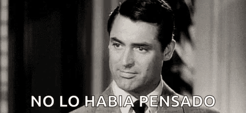 a black and white photo of a man in a suit and tie with the words `` no lo habia pensado '' written below him .