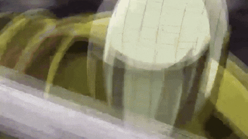 a close up of a toothbrush being used to brush a person 's teeth in a painting .