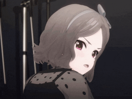 a close up of a girl 's face with a bow on her head