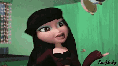 a bratz doll is standing in a room with a green curtain behind her