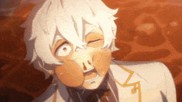 a close up of a person 's face with a surprised look on his face