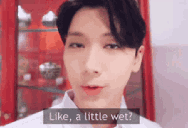 a close up of a man 's face with the words `` like , a little wet ? ''
