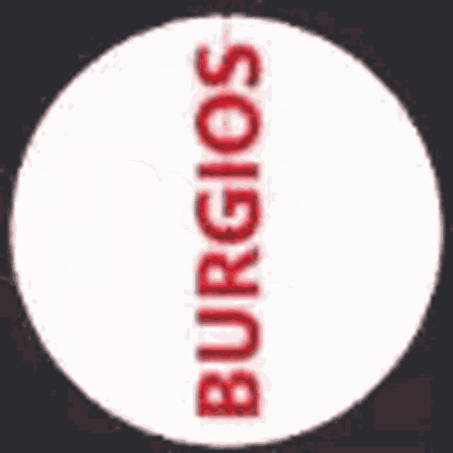 a white circle with red letters that says burgos on it .