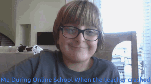 a boy wearing glasses is smiling with the words me during online school when the teacher crashed below him