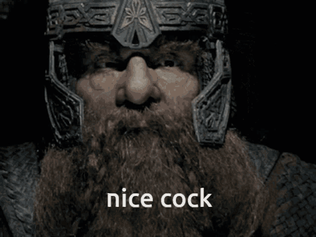 a man with a beard wearing a helmet has the words nice cock below his face