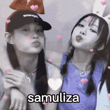 two girls are posing for a picture with the name samuliza written on the bottom