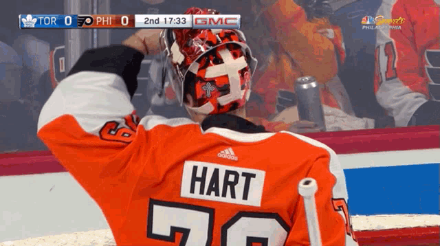 a hockey player wearing a jersey that says hart