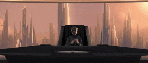 a man sits in front of a futuristic city