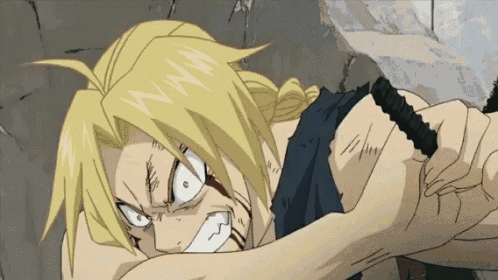 a cartoon character with a very angry face is laying on the ground