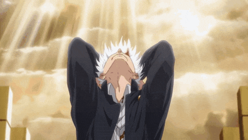 a man in a suit and tie looks up at the sky