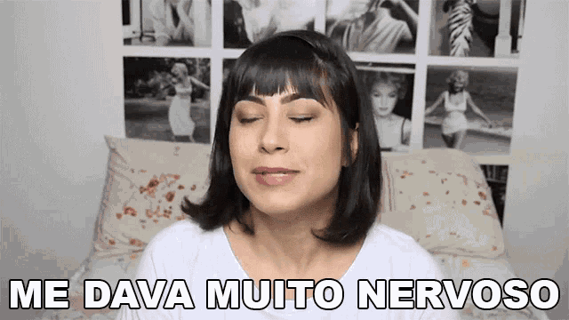a woman says me tava muito nervoso in front of a wall of pictures