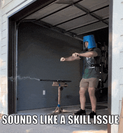 a man wearing a blue bucket on his head stands in a garage doorway with the caption sounds like a skill issue