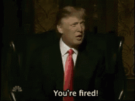 donald trump says you 're fired while wearing a black suit and red tie