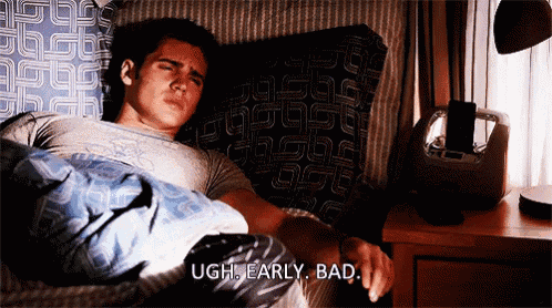 a man is laying in bed with the words ugh early bad written on the bottom
