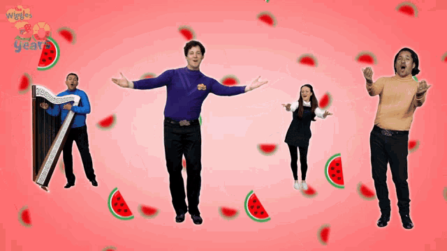 a group of people are dancing in front of watermelons and the word wiggle is visible