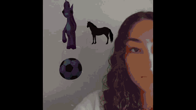 a woman 's face is surrounded by balloons and a horse