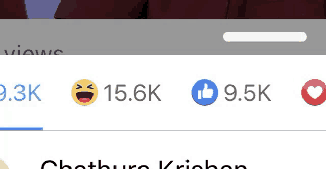 a screenshot of a facebook page with a smiley face and a thumbs up