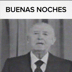 a man in a suit and tie is giving a speech and the words buenas noches are above him