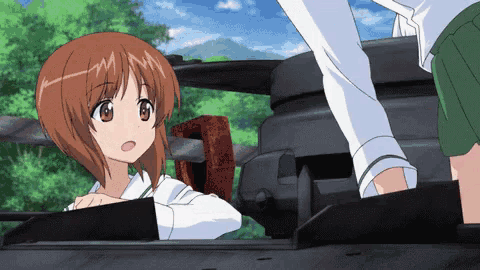 a girl in a white shirt and green skirt is looking out of a tank window
