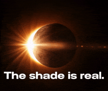 a picture of a partial eclipse with the words " the shade is real " below it