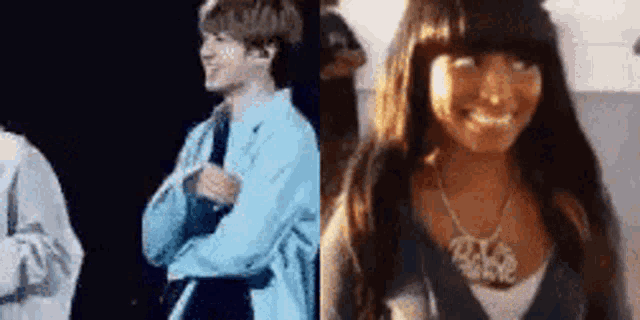 a man and a woman are standing next to each other .