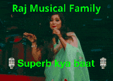 a woman singing into a microphone with the words raj musical family superb kya baat written below her