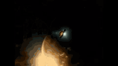 a silhouette of a person in a dark room with smoke coming out of them