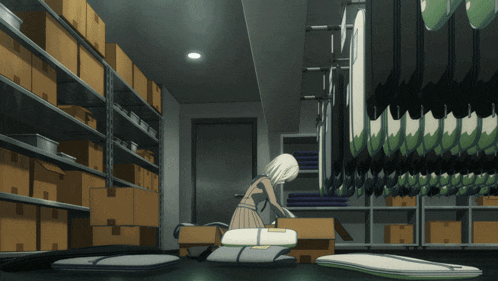 a woman is kneeling down in a room filled with boxes and shelves
