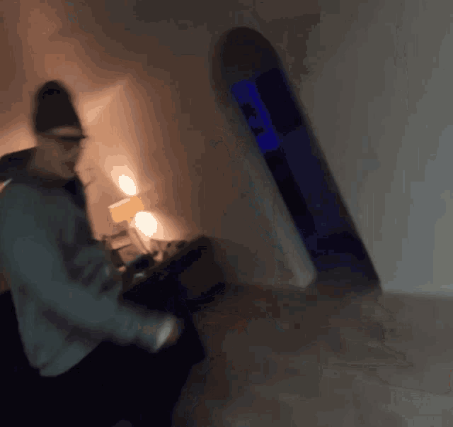 a blurry picture of a man in a room