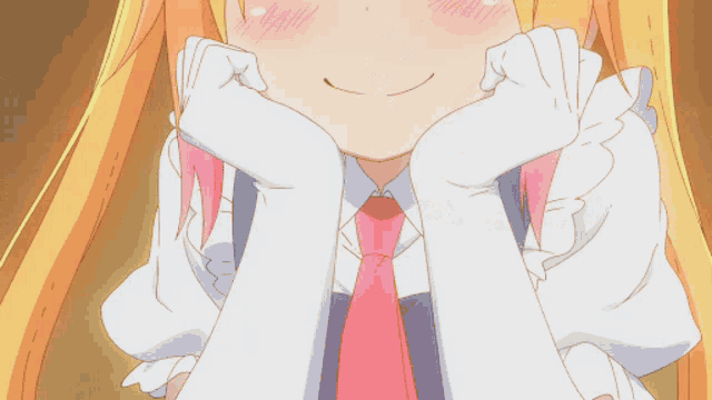 a girl with horns is laying on another girl 's stomach
