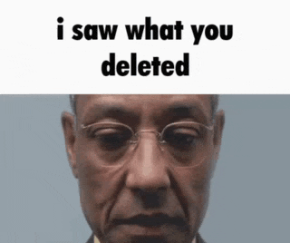 a close up of a man 's face with glasses and the words `` i saw what you deleted '' above it .