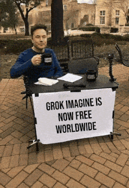 elon musk is sitting at a table with a sign that says grok imagine is now free worldwide