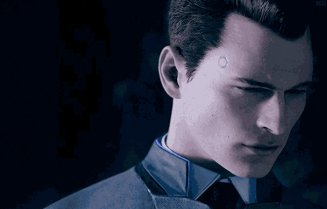 a close up of a man 's face with a blue light on his forehead
