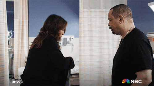 a man and a woman are standing in a hospital room with a nbc logo on the bottom