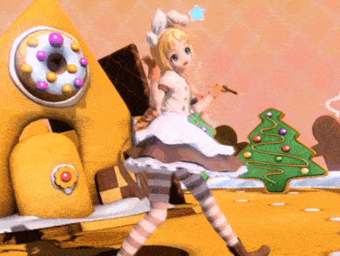 a girl in a white dress is standing next to a christmas tree and a donut