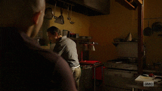 a man is holding a plate of food and says you 're gonna die