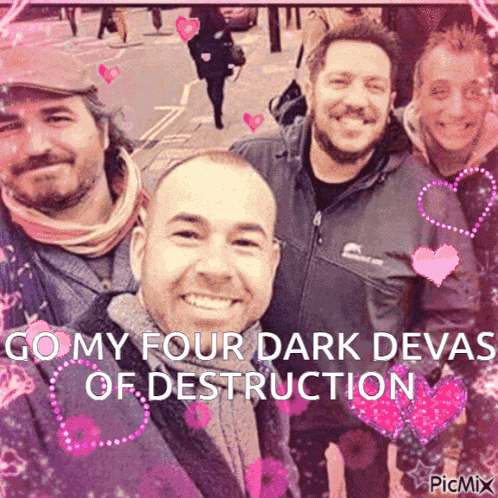 a group of men are posing for a picture and the caption says go my four dark devas of destruction