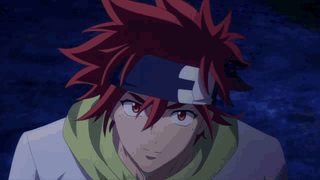a man with red hair and a bandage on his head