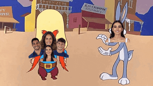 a group of people are posing for a picture with bugs bunny in the background