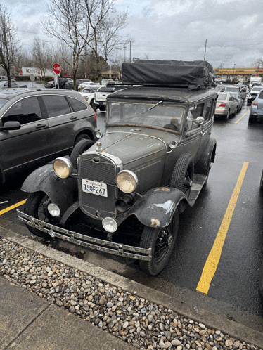 an old car with a license plate that says 150f267