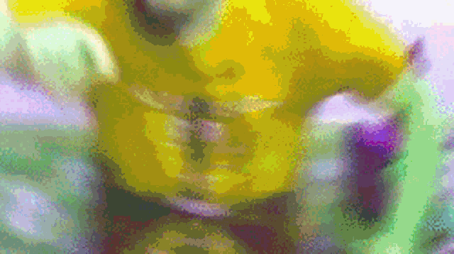 a blurred image of a yellow object with a purple background