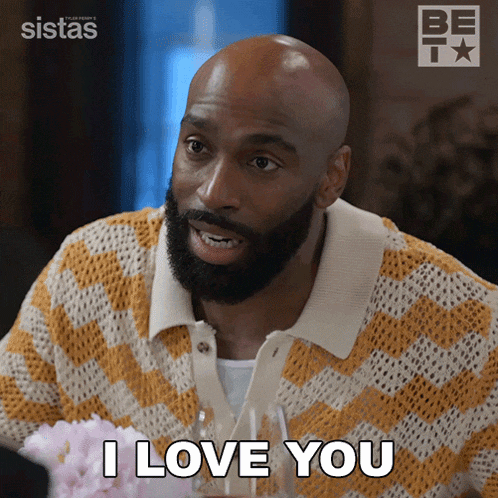 a bald man with a beard says " i love you "