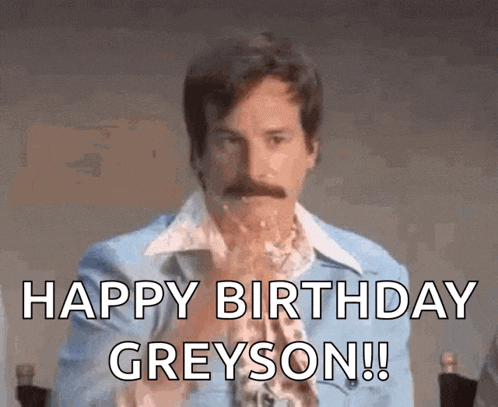 a man with a mustache is holding a glass of wine and says happy birthday greyson !