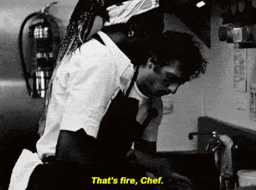 a black and white photo of a man and a woman with the words that 's fire chef below them