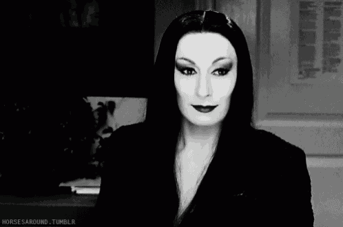 a black and white photo of a woman with the words horses around tumblr written below her