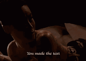 a woman is laying on a bed with a man and the words `` you must sign it '' written on the bottom .