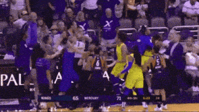 a basketball game between the wings and the mercury team