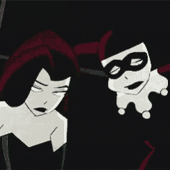 harley quinn and poison ivy are standing next to each other in the dark .