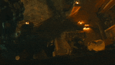 an aerial view of a room with sparks coming out of the floor